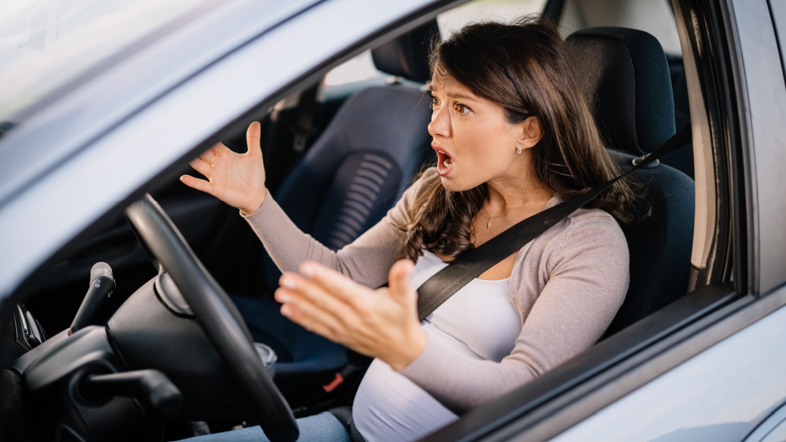 pregnant woman angry driver car yelling Pavle Bugarski shutterstock