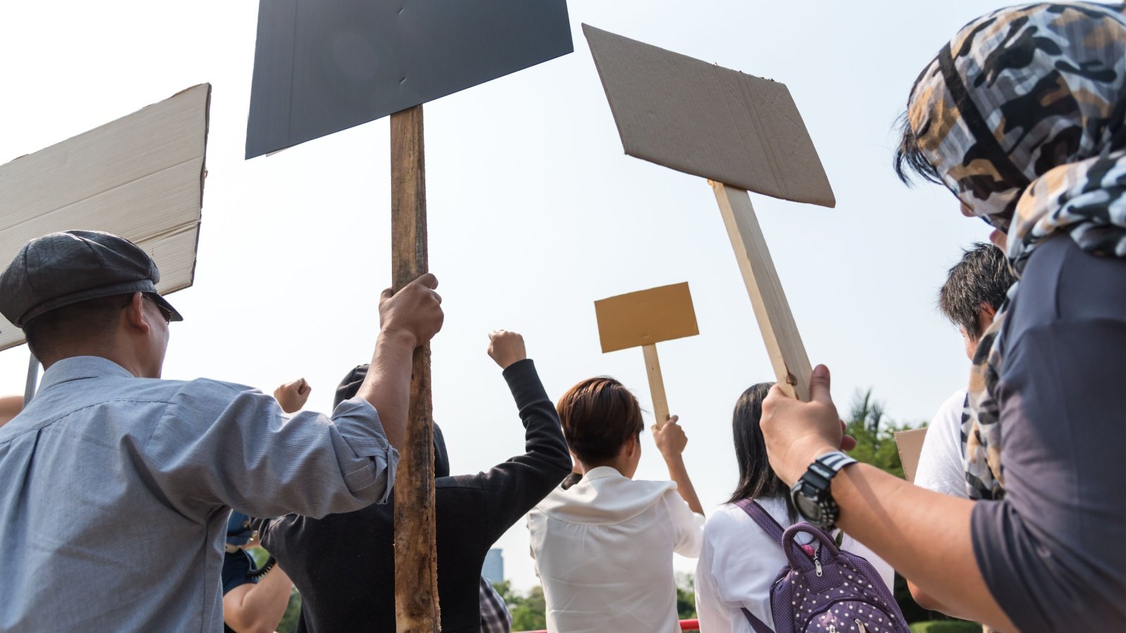 protest signs mob protest social justice public activists boycott voy ager Shutterstock