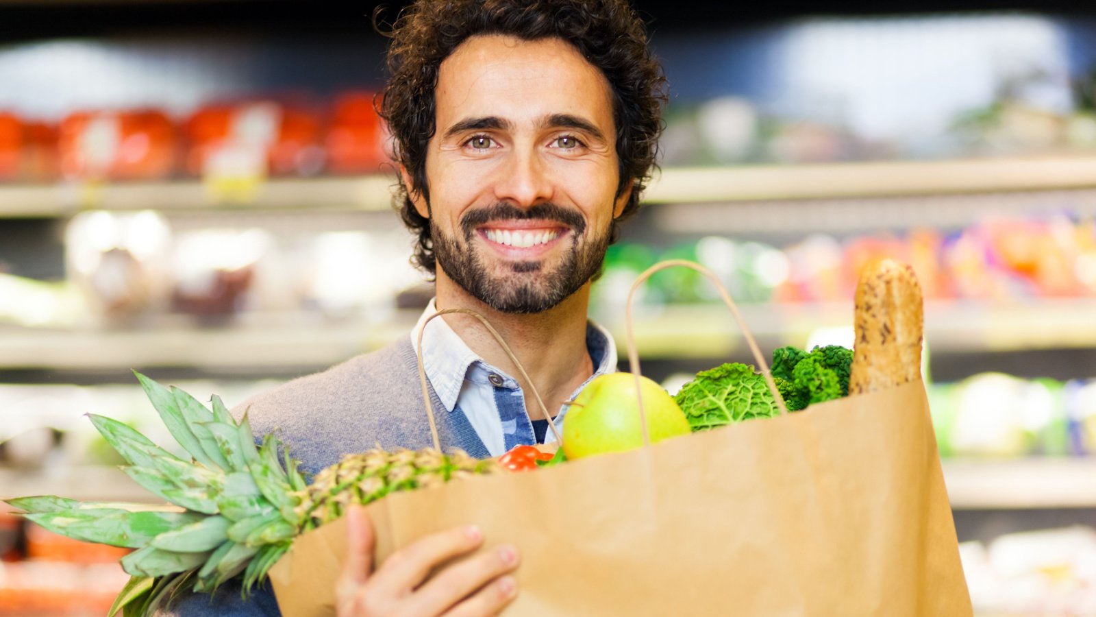 shopping in a supermarket grocery store fruit minerva studio shutterstock