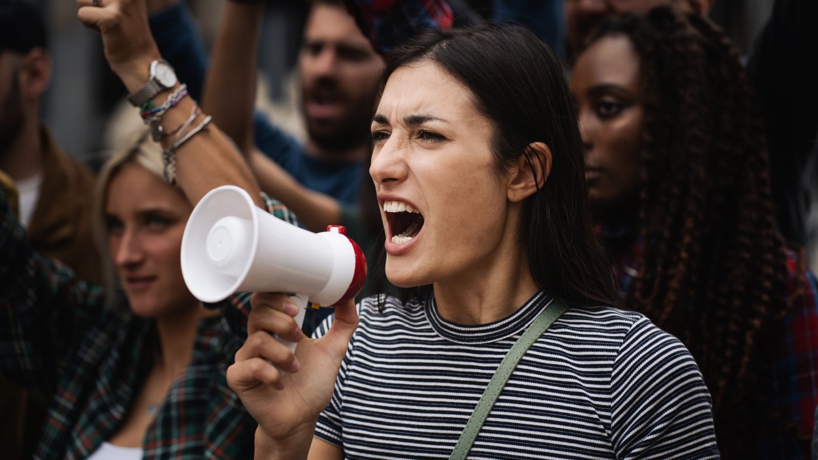 shouting loud through megaphone protest civil rights angry advocate Lomb Shutterstock