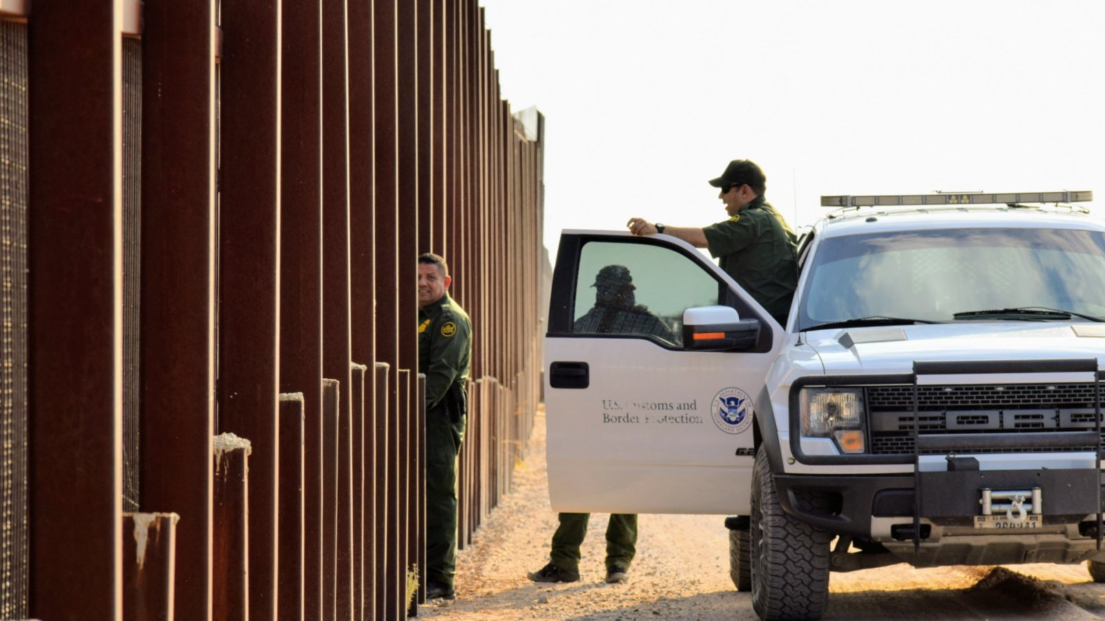 texas us border crossing guard fence Poli Pix Co. LLC shutterstock