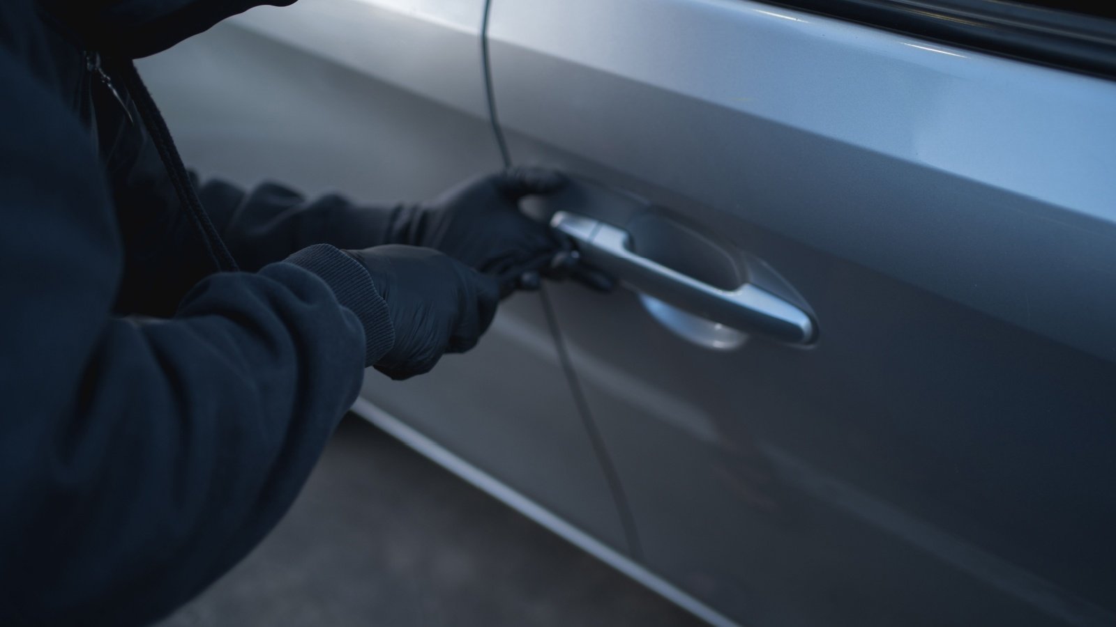 thief stealing a car theft crime carjack PBXStudio Shutterstock