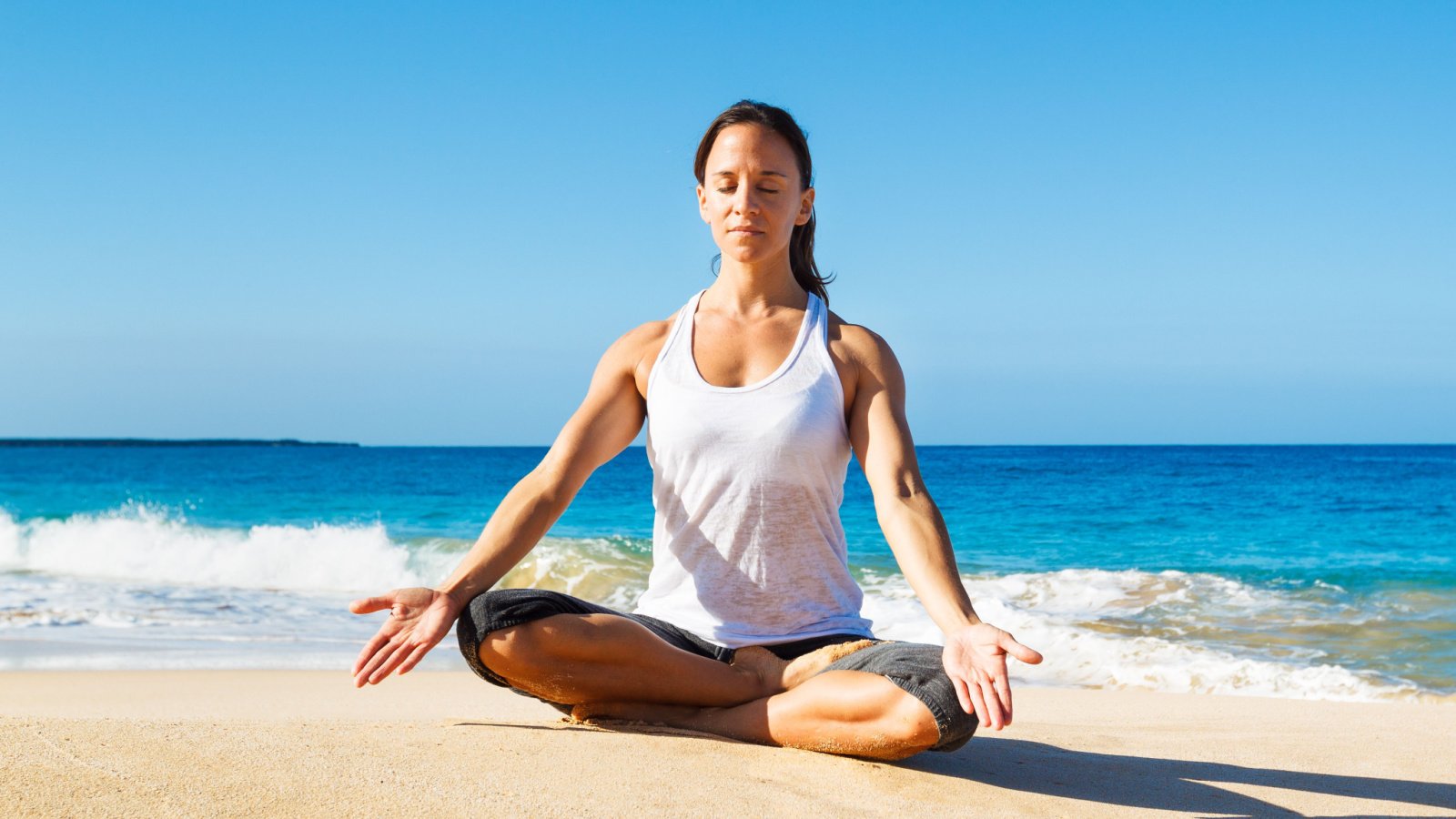 traveler zen on the beach ocean epicstockmedia shutterstock