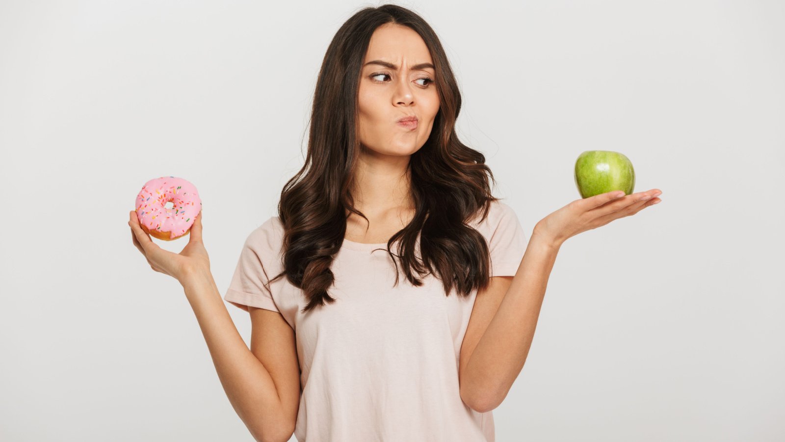 woman choosing healthy food diet dean drobot shutterstock