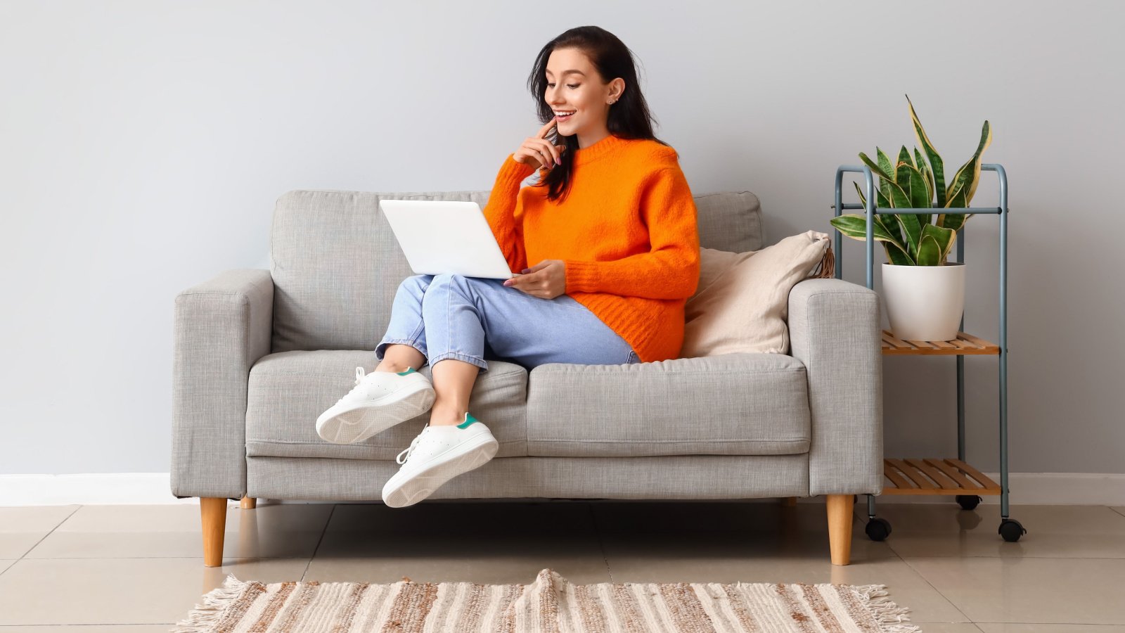 woman home computer couch social pixel shot shutterstock home design decor