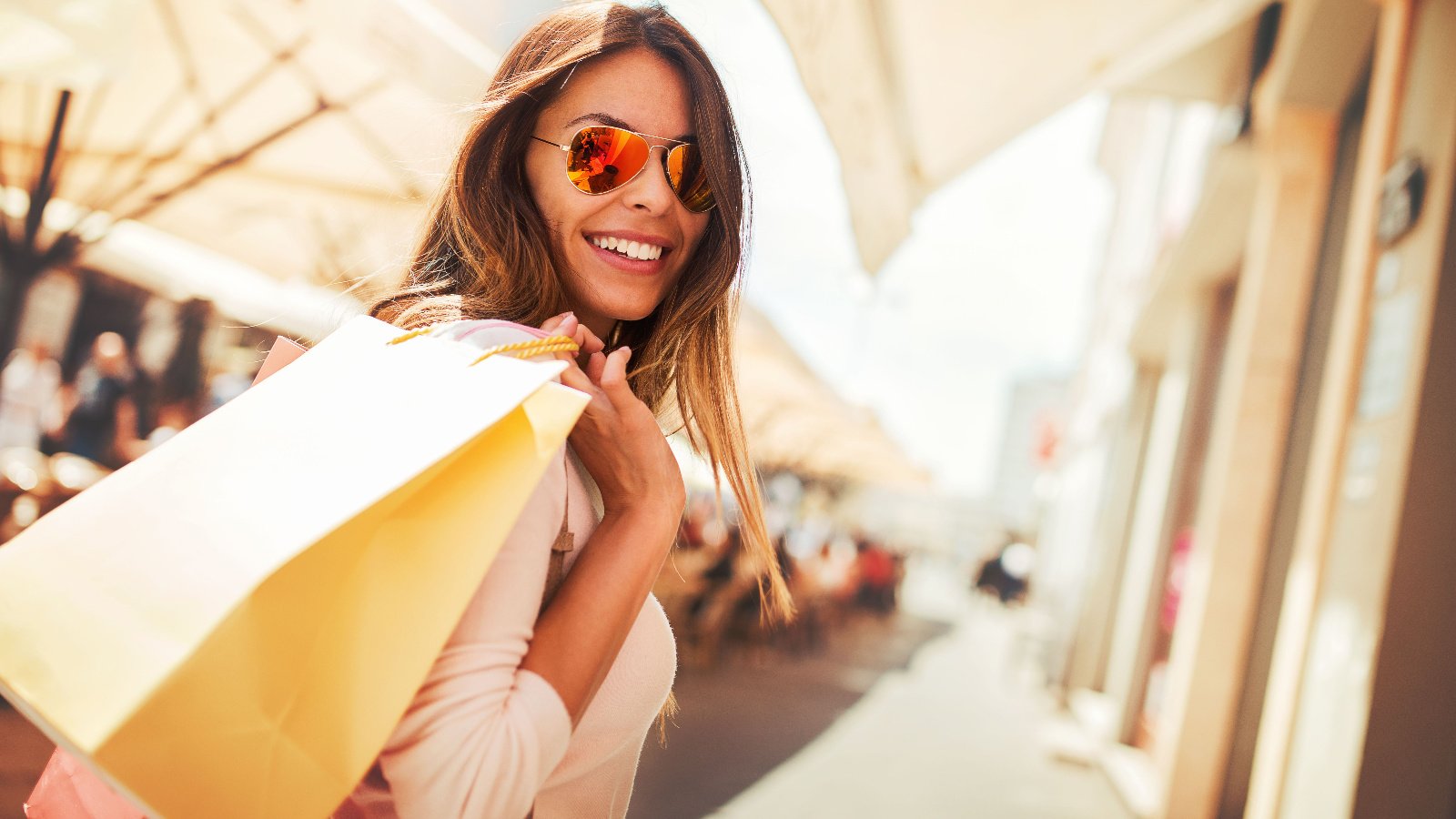 woman shopping bag malls department store Bobex 73 shutterstock