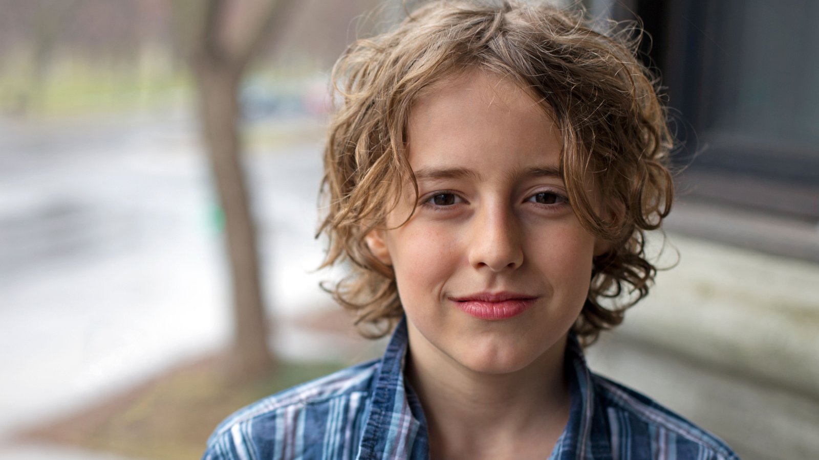 young boy child kid smirk tween teen gdvcom shutterstock