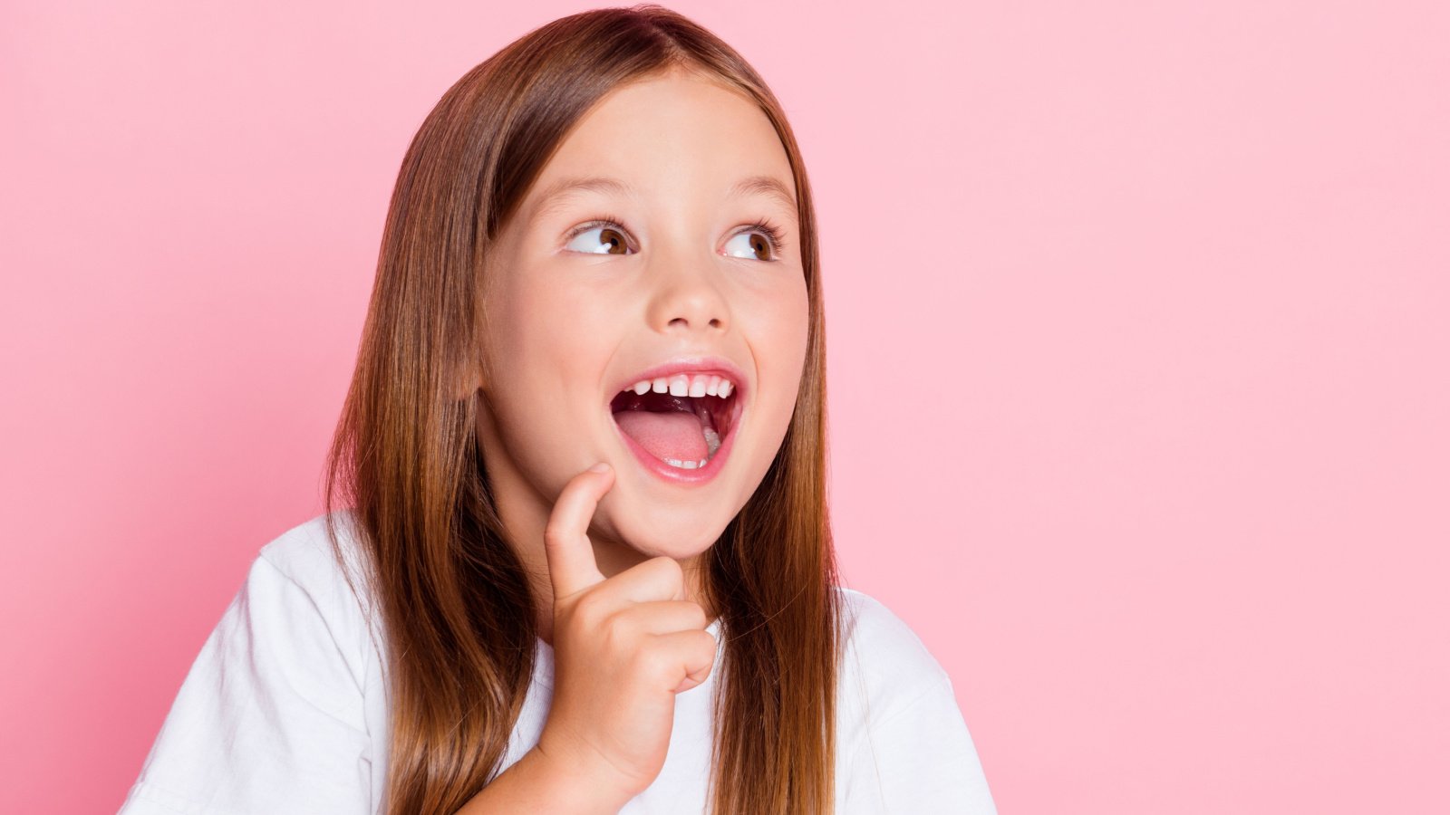 young clever girl child smile kid hand on chin roman samborskyi shutterstock