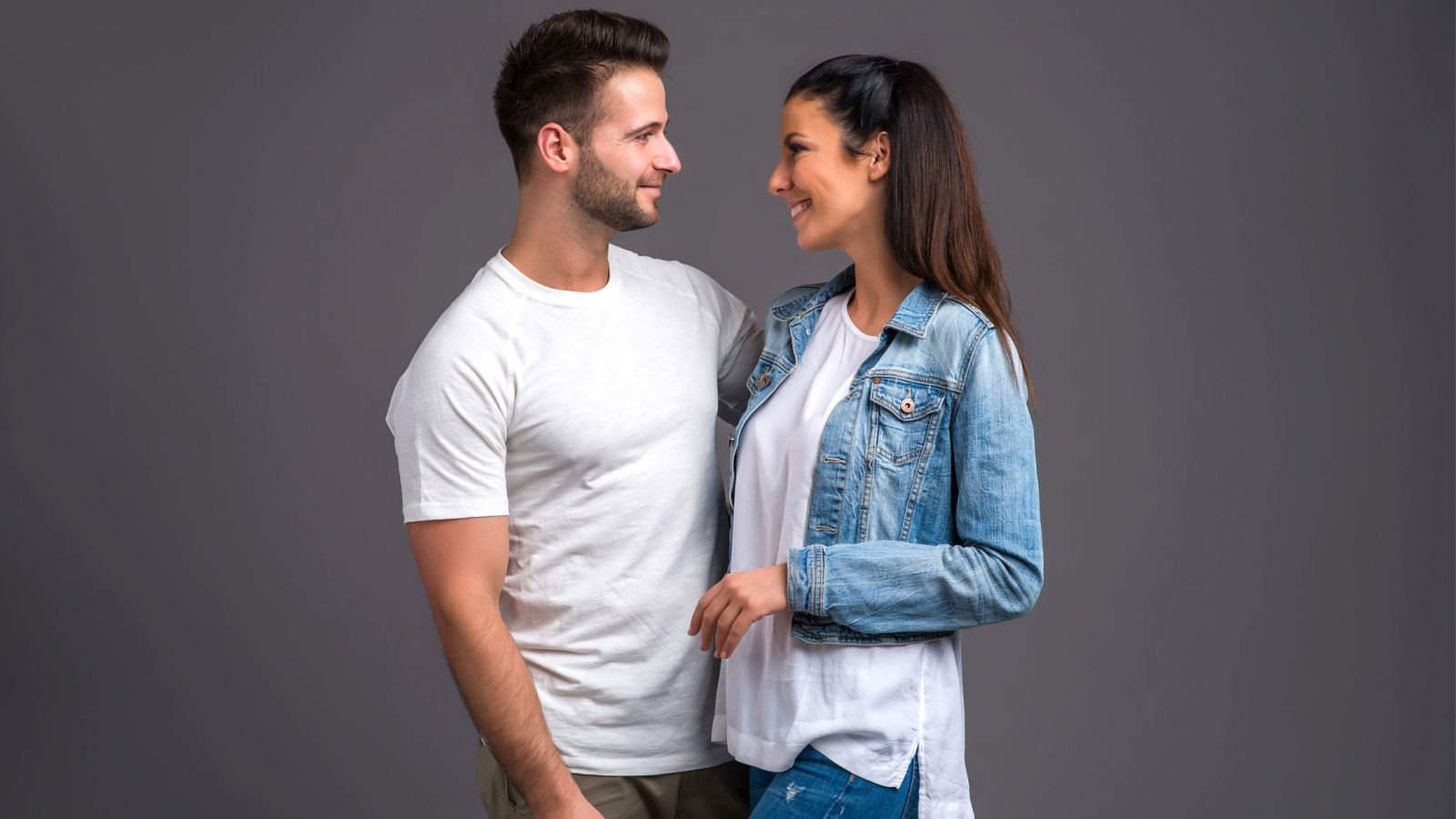 young couple hugging and holding each other together spectral design shutterstock young couple hugging and holding each other together spectral design shutterstock