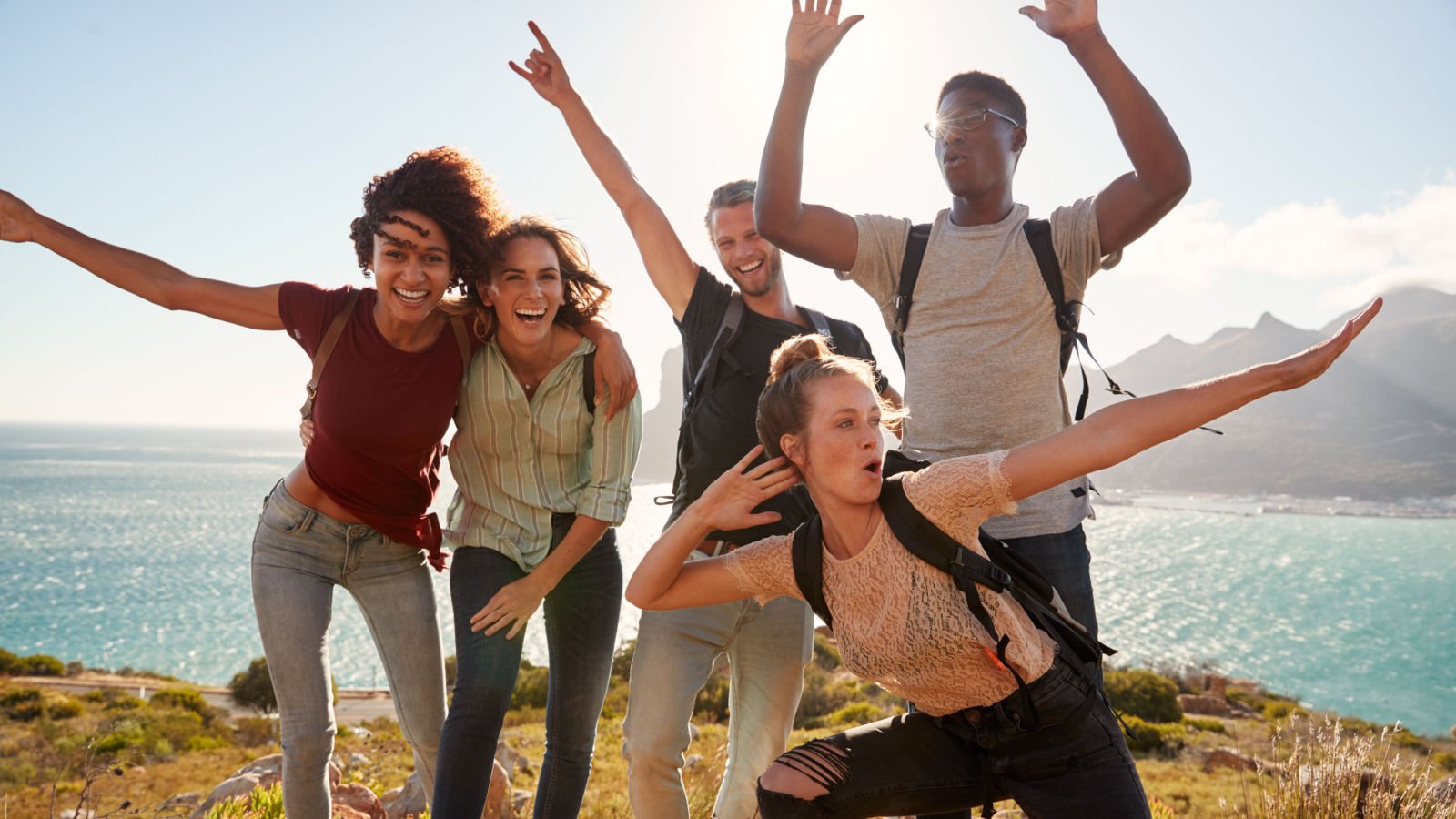 young friends hiking travel outdoors monkey business images shutterstock