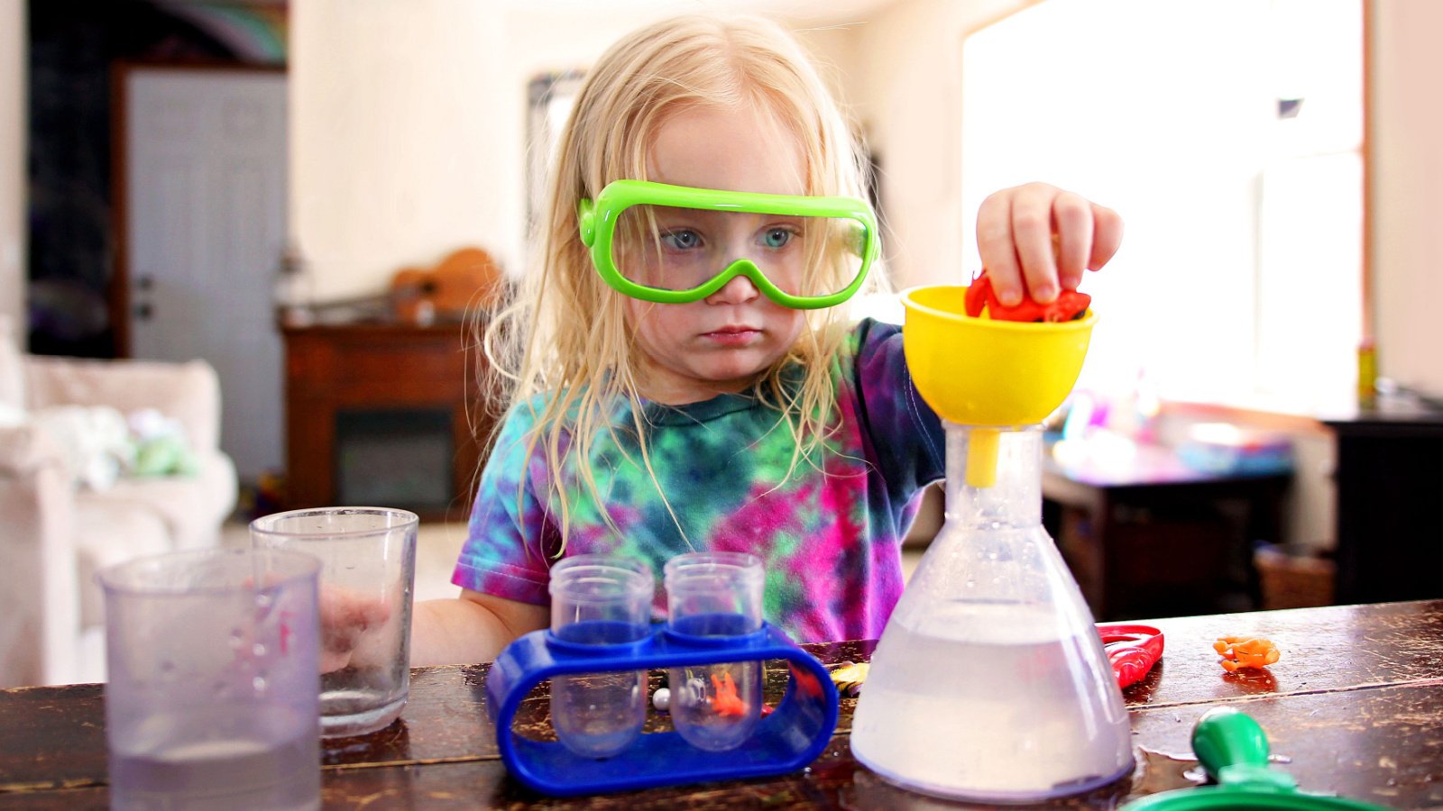 young girl doing science playing Christin Lola shutterstock