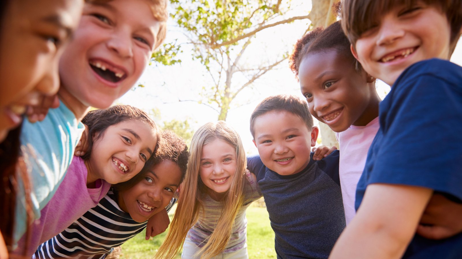 young kids children together playing Monkey Business Images shutterstock