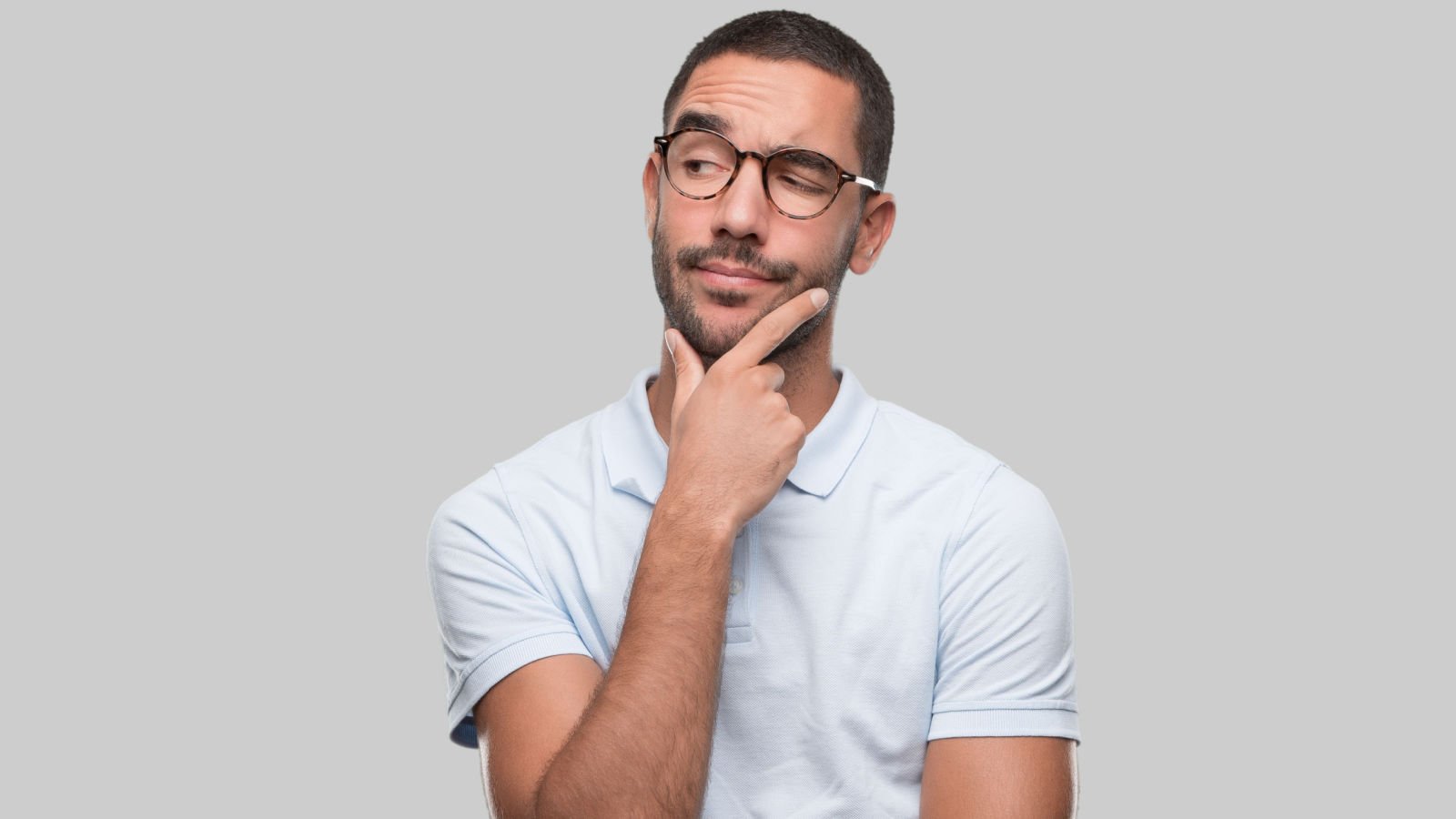 young male doubtful thinking algonga shutterstock