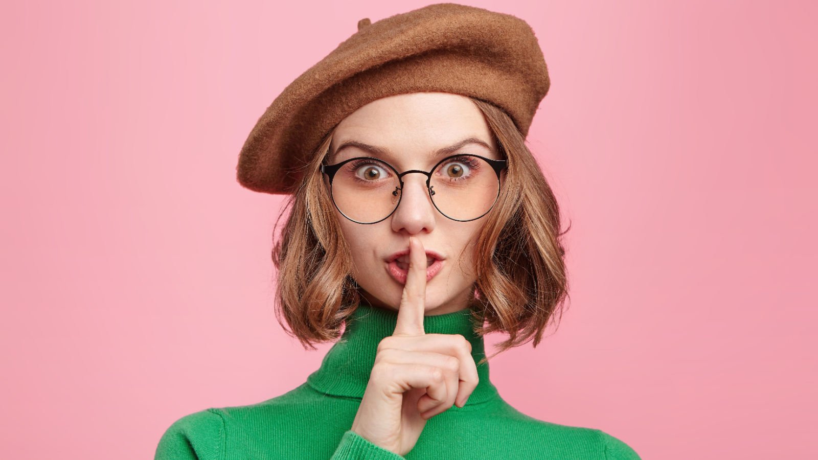 young woman quiet lips silent secret retro hat cast of thousands shutterstock